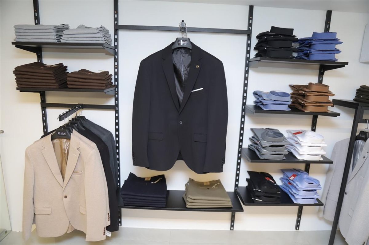 افتتاح فرع جديد لمحلات العجمي للألبسة الرجالية Al Ajami store في صور