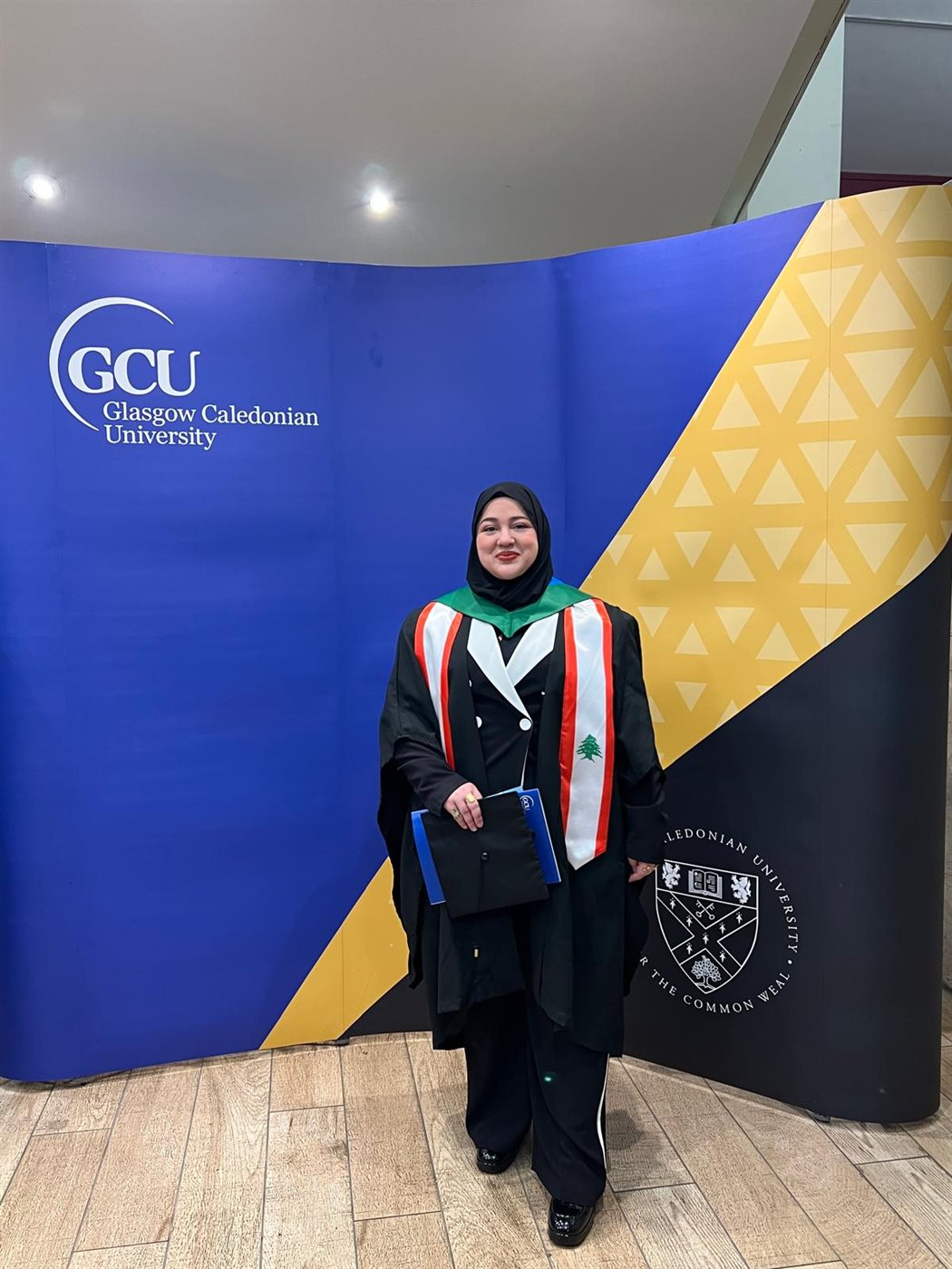 شهادة في البكولوريوس للطالبة زينب سعادة