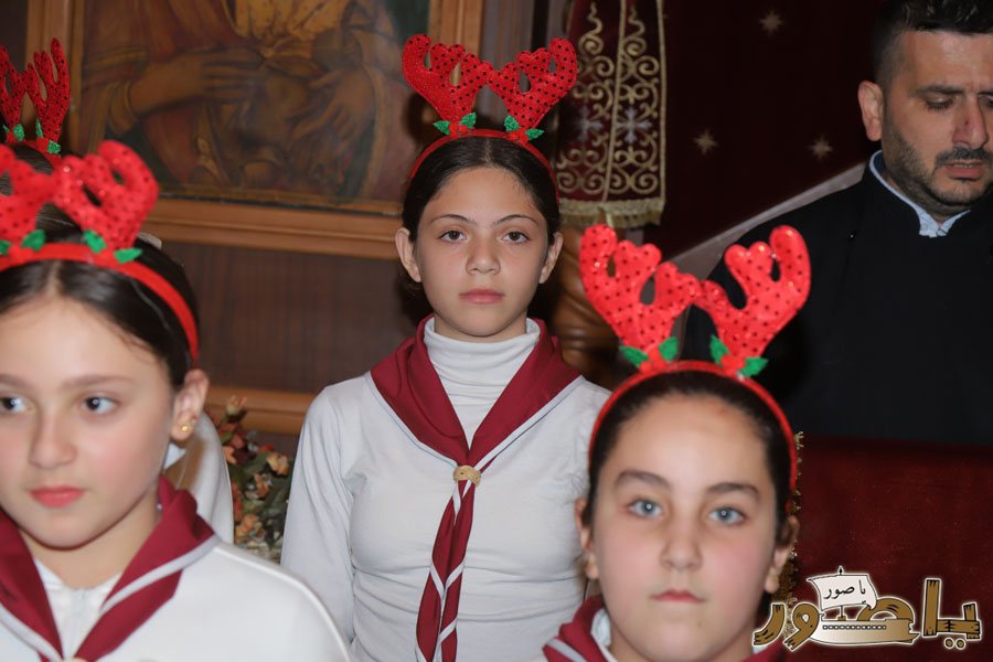 رسيتال ميلادي حاشد في كنيسة مار توما للروم الأرثوذكس صور