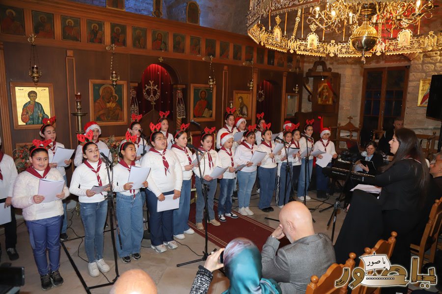 رسيتال ميلادي حاشد في كنيسة مار توما للروم الأرثوذكس صور