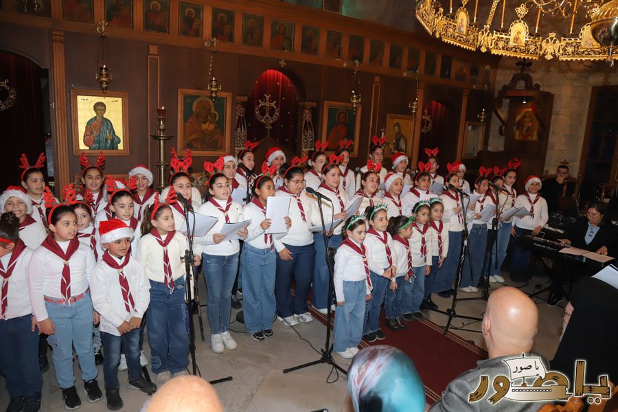 رسيتال ميلادي حاشد في كنيسة مار توما للروم الأرثوذكس صور