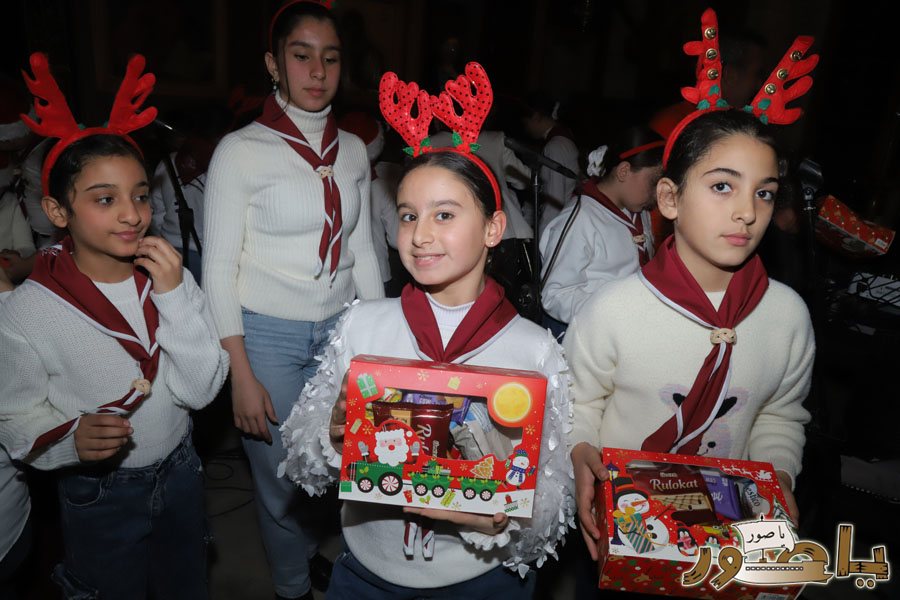 رسيتال ميلادي حاشد في كنيسة مار توما للروم الأرثوذكس صور