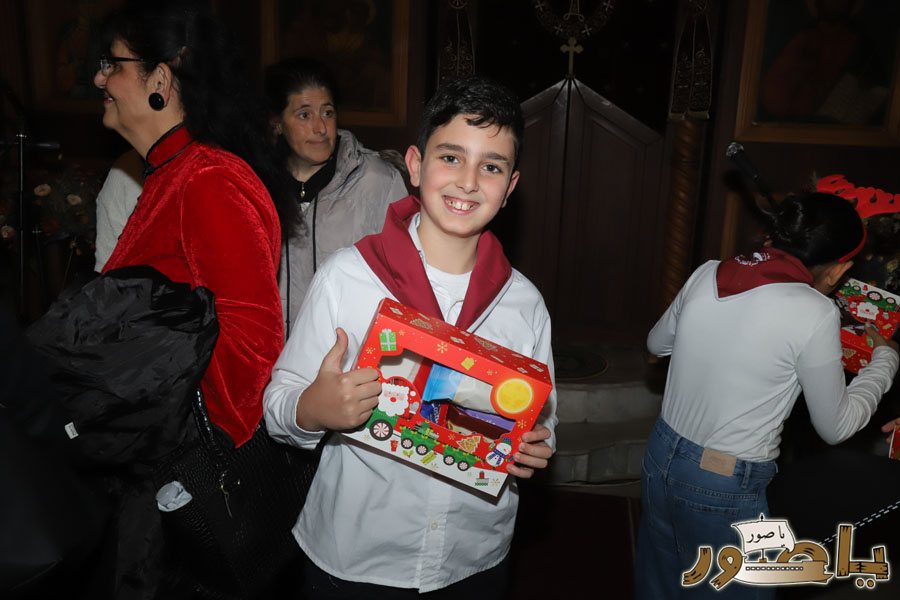 رسيتال ميلادي حاشد في كنيسة مار توما للروم الأرثوذكس صور