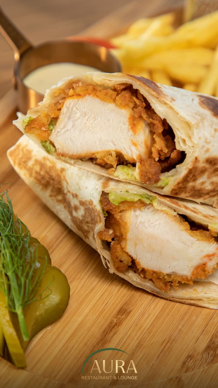 عند AURA RESTAURANT LOUNGE .. الذوق الأجواء والمتعة كلها بمكان واحد